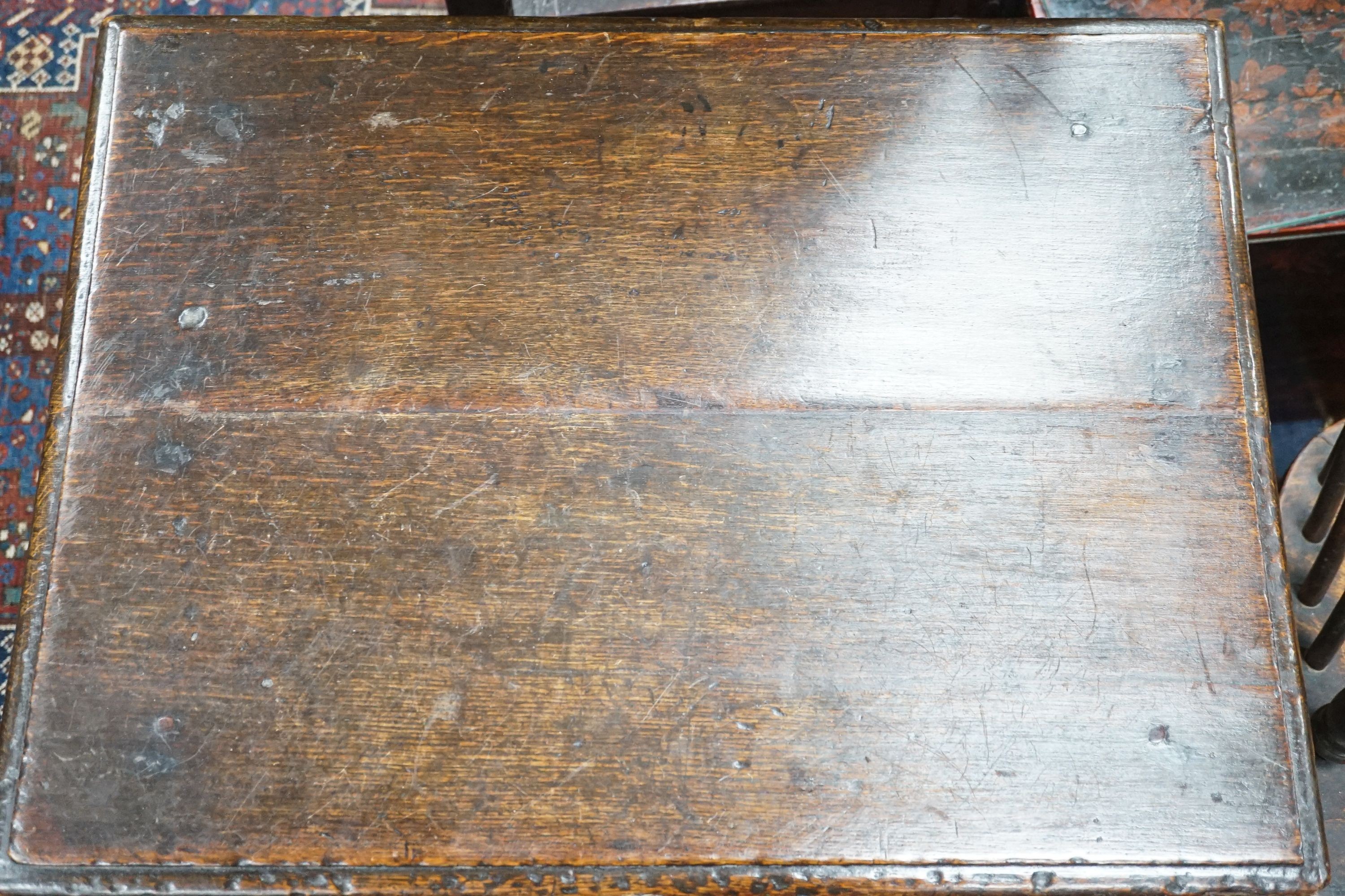 A William and Mary rectangular oak side table on turned legs with H stretcher, width 65cm, depth 50cm, height 69cm